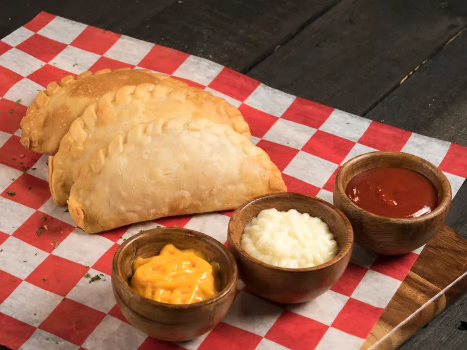 Empanada de Queso - Crispy empanada with melted cheese filling