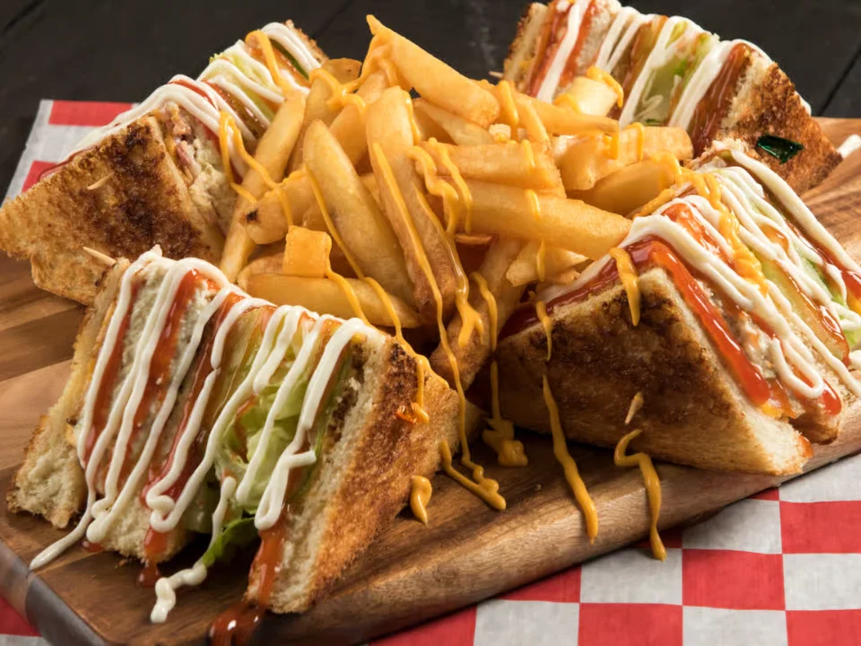 Turkey and Swiss Club - Classic club sandwich with turkey and Swiss cheese